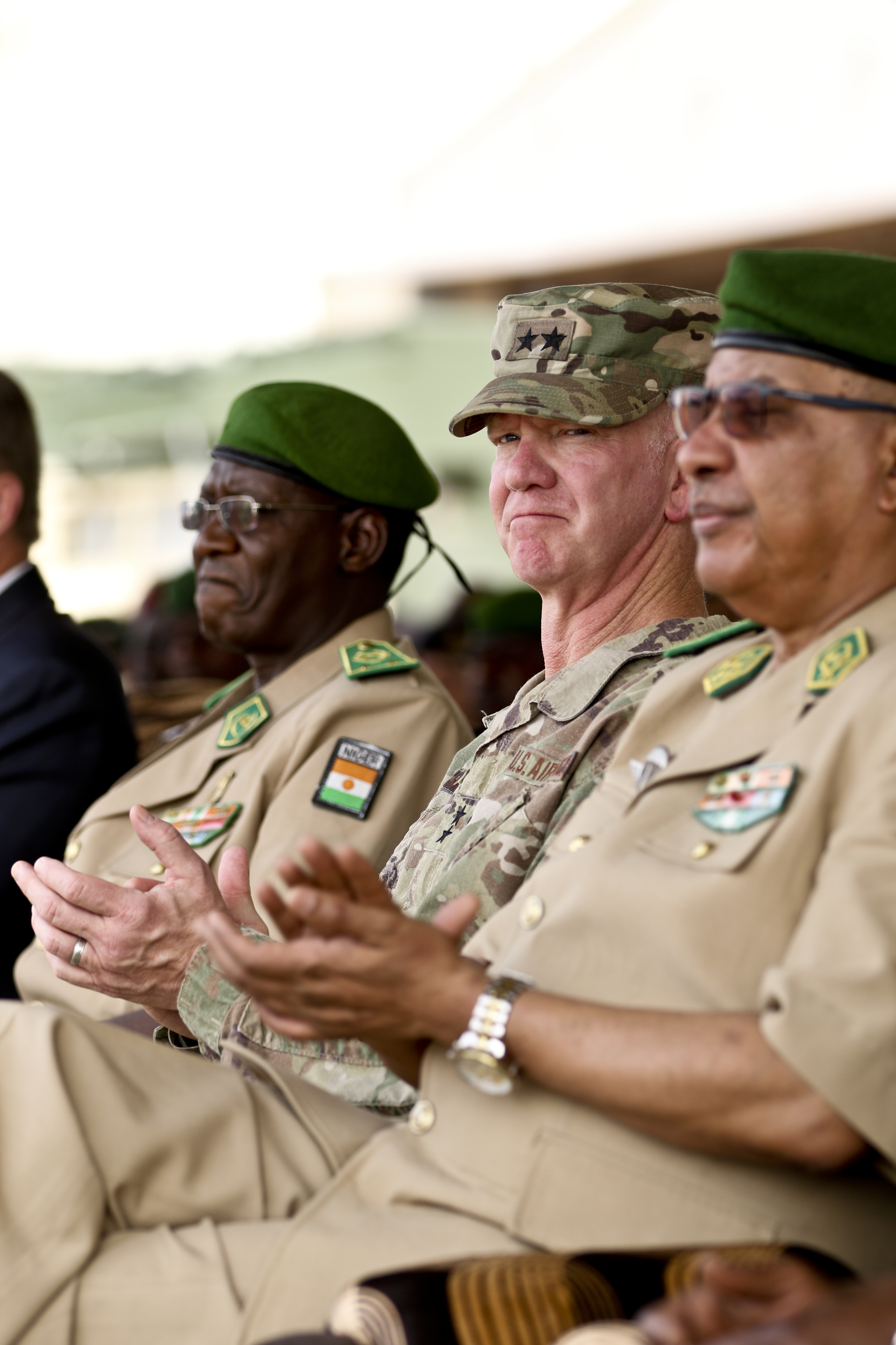 NIAMEY, Niger â U.S. Air Force Maj. Gen. Marcus Hicks, commander, Special Operations Command Africa, applauds during the opening ceremony of Flintlock 2018 in Niamey, Niger, April 11, 2018. Approximately 1,900 service members from more than 20 African and western partner nations are participating in Flintlock 2018 at multiple locations in Niger, Burkina Faso, and Senegal. (U.S. Army Photo by Sgt. Heather Doppke/79th Theater Sustainment Command)