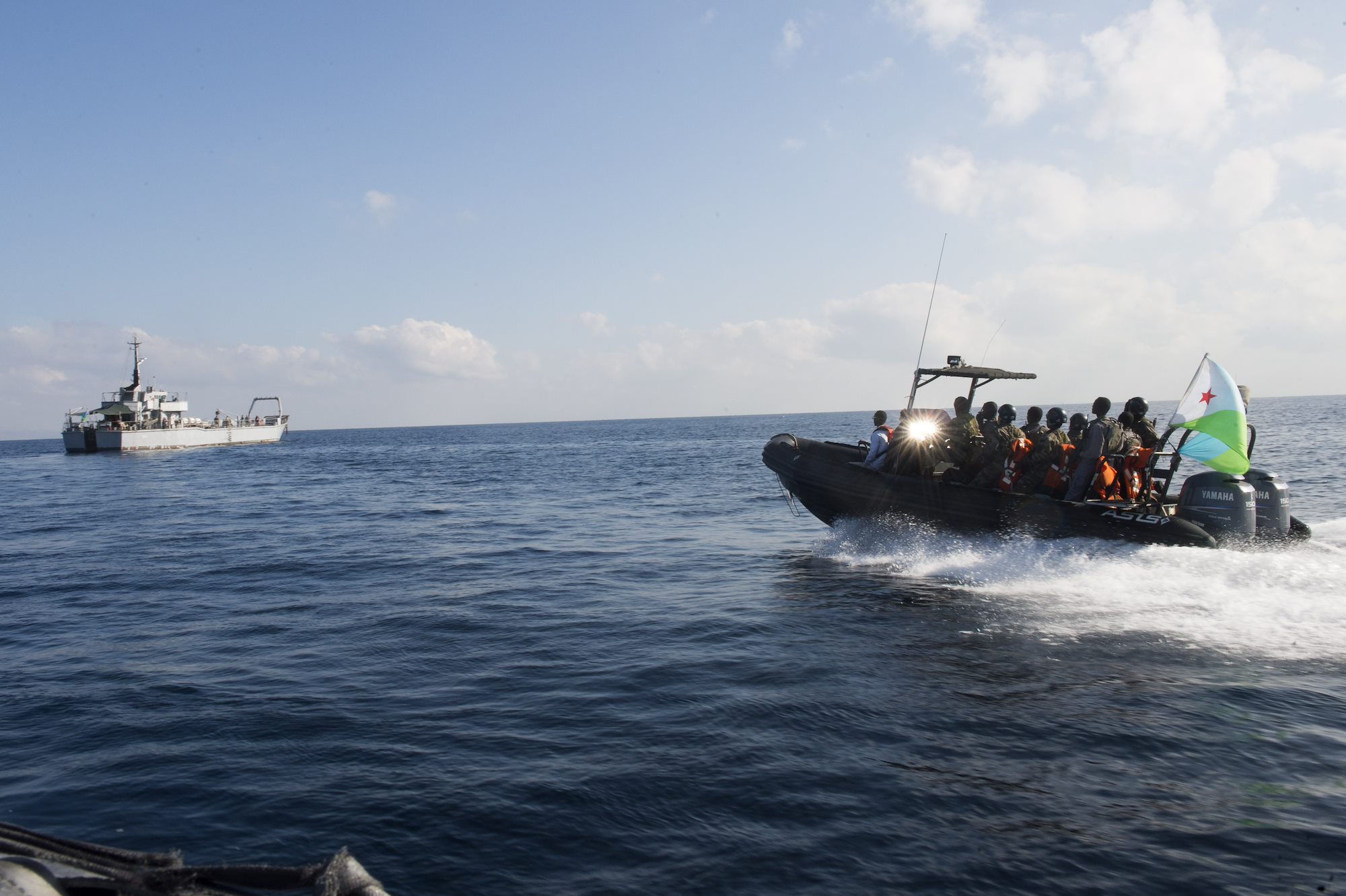 Djibouti Navy and Coast Guard boarding Vessel approaches Target Vessel 