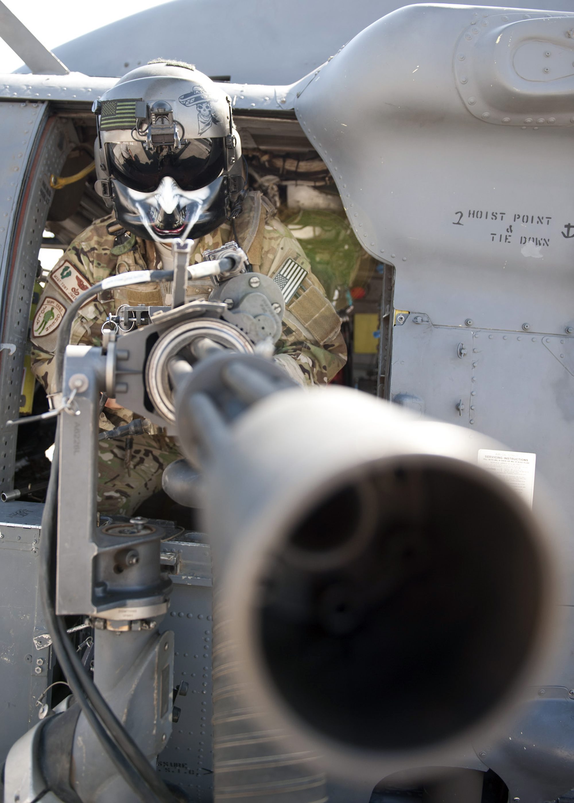 303rd Expeditionary Rescue Squadron Special Mission Aviator simulates ‘Stand Ready’ with GAU-2 Mini-Gun