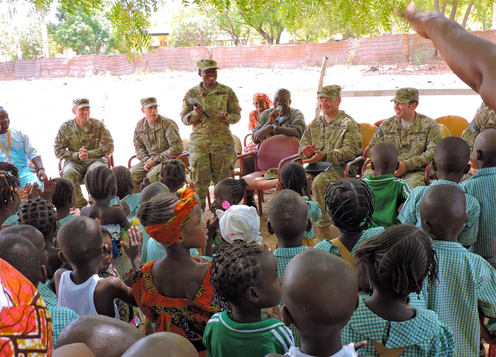 U.S. Soldiers present donated educational supplies to Cameroonian school children