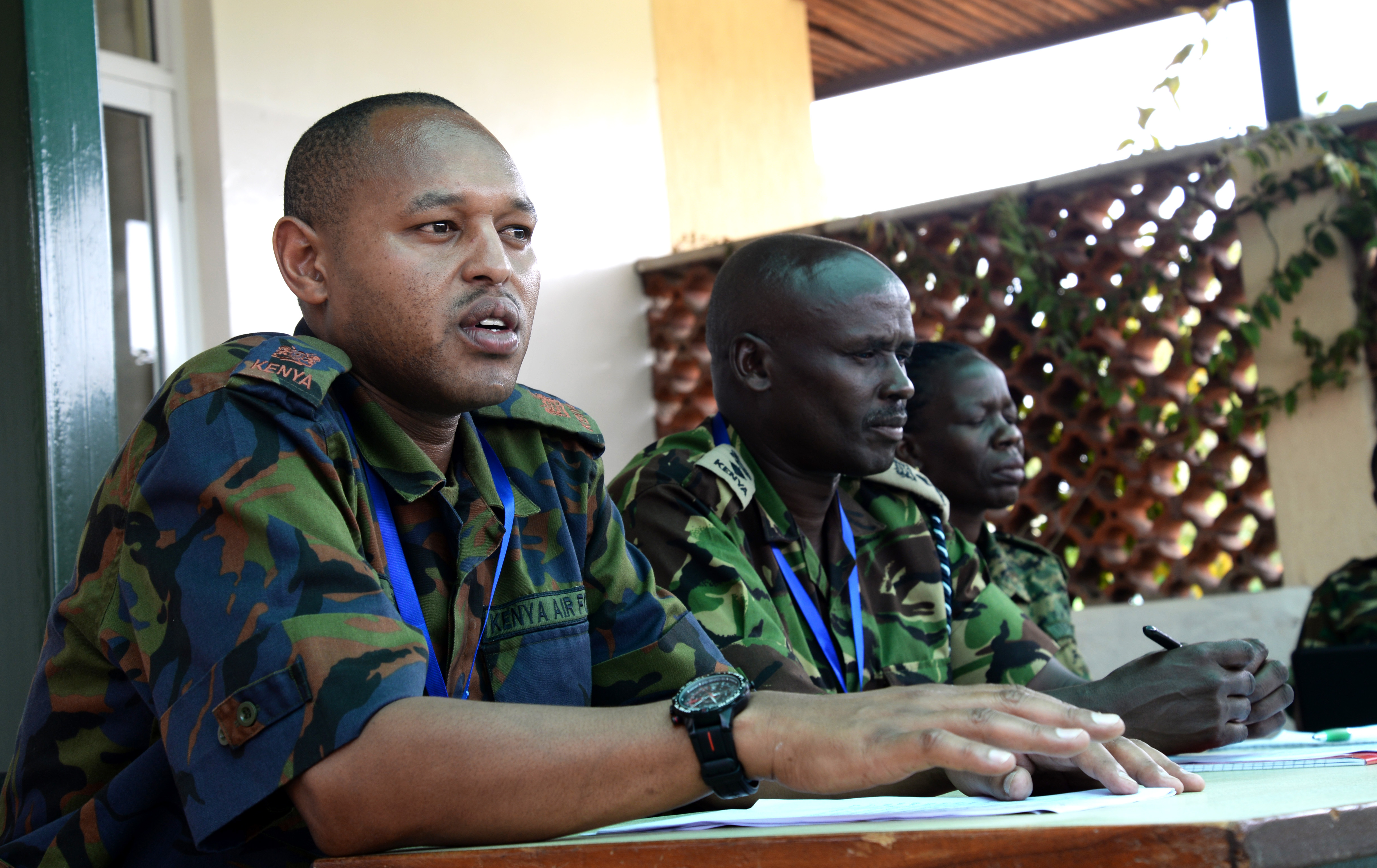 Officers from Kenya, Burundi and Uganda prepare for a simulated press conference March 3, 2016, during an exercise to complete an AMISOM staff officer course in Nairobi, Kenya. The practice press conference tested the public information officers’ ability to prepare and present a press conference. (U.S. Air Force photo by Staff Sgt. Kate Thornton)