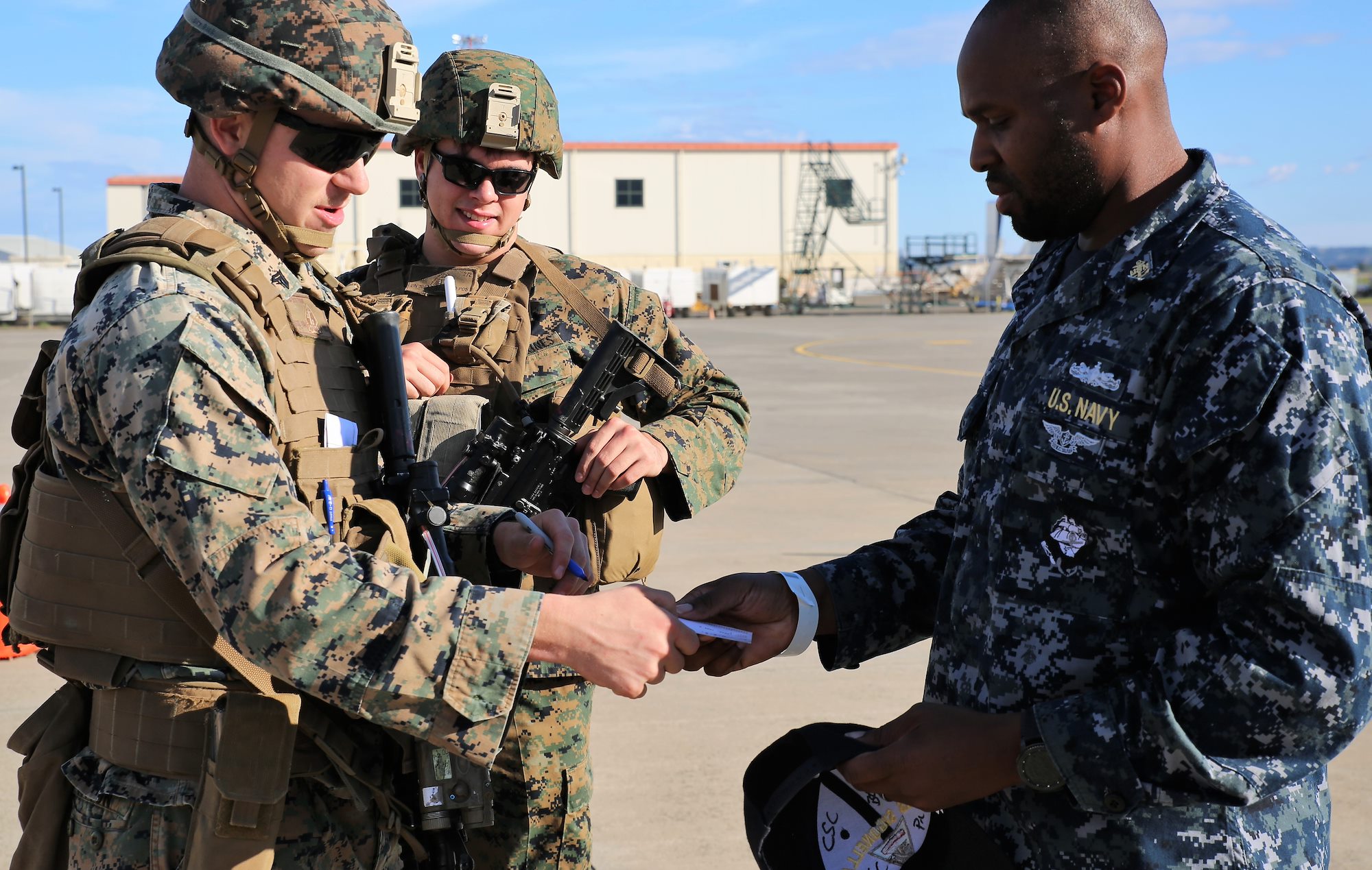 SPMAGTF-CR-AF Marines and Sailors conduct evacuation control center training