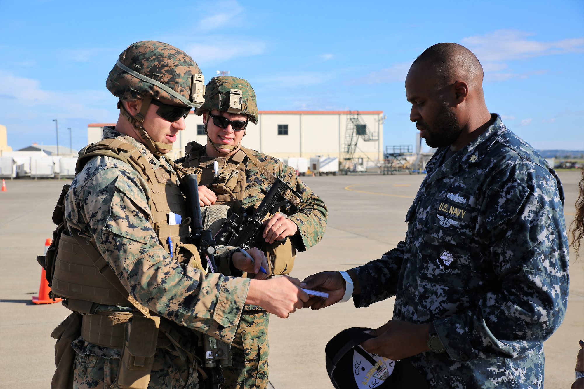 SPMAGTF-CR-AF Marines and Sailors conduct evacuation control center training