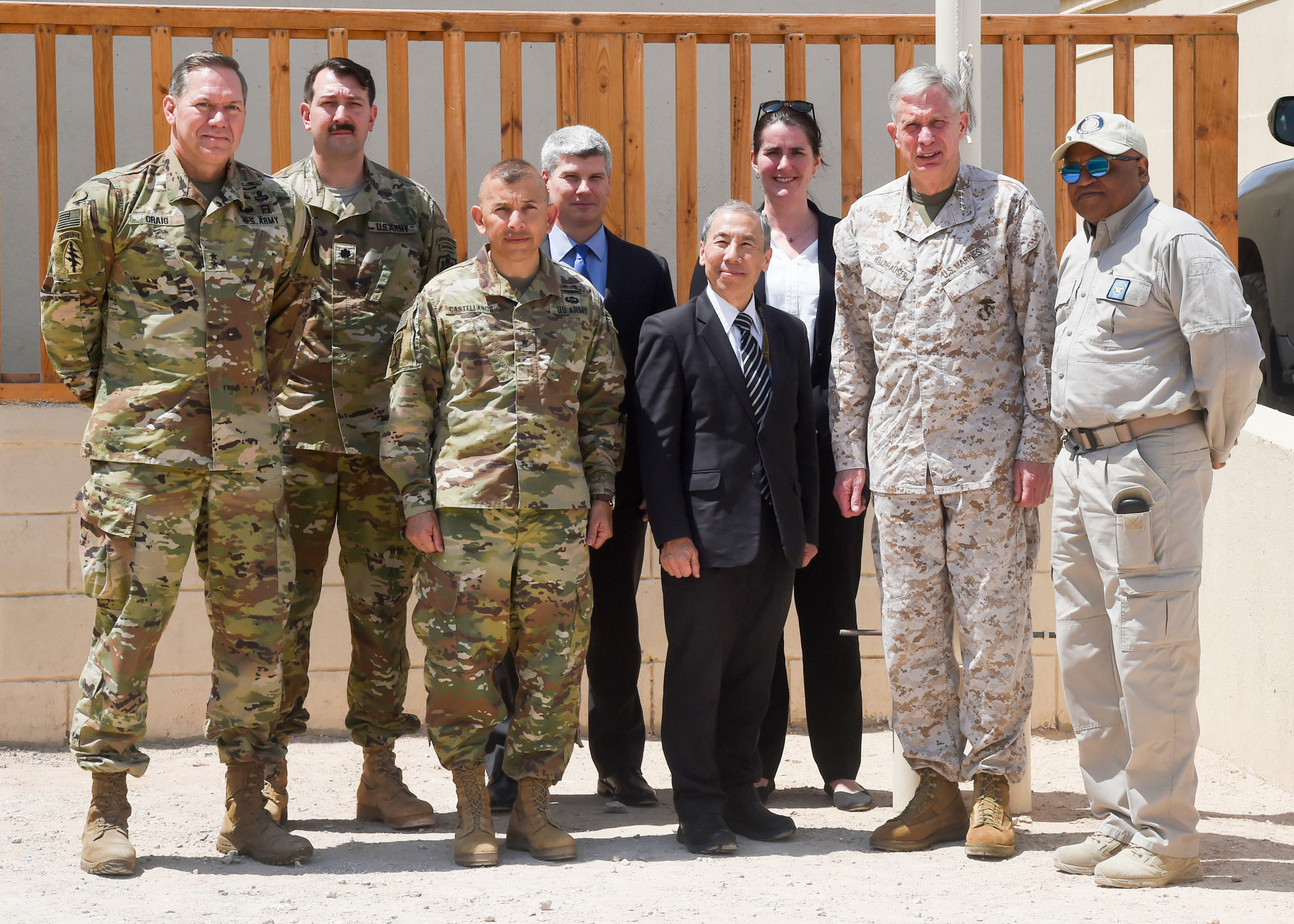 MOGADISHU, Somalia â U.S. Marine Gen. Thomas D. Waldhauser (right), commanding general, U.S. Africa Command, U.S. Ambassador to Somalia Donald Yamamoto (center), and U.S. Army Major Gen. James D. Craig (left), commanding general, Combined Joint Task ForceâHorn of Africa, pose for a photo with officers and U.S. officials in Mogadishu, Somalia Nov. 27, 2018. During his visit to Mogadishu Waldhauser also met with Somali President Mohamed Abdullahi Mohamed to discuss development, security and stability in Somalia. (U.S. Navy Photo by Mass Communication Specialist 1st Class Nick Scott) 