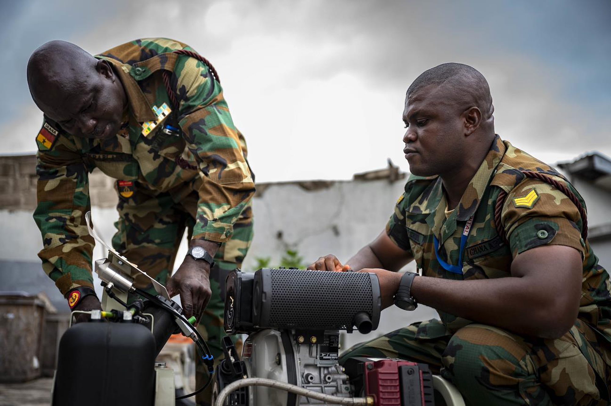 Members of the Ghana Army troubleshoot machinery at the Africa Malaria Task Force (AMTF) conference, July 18, 2023.